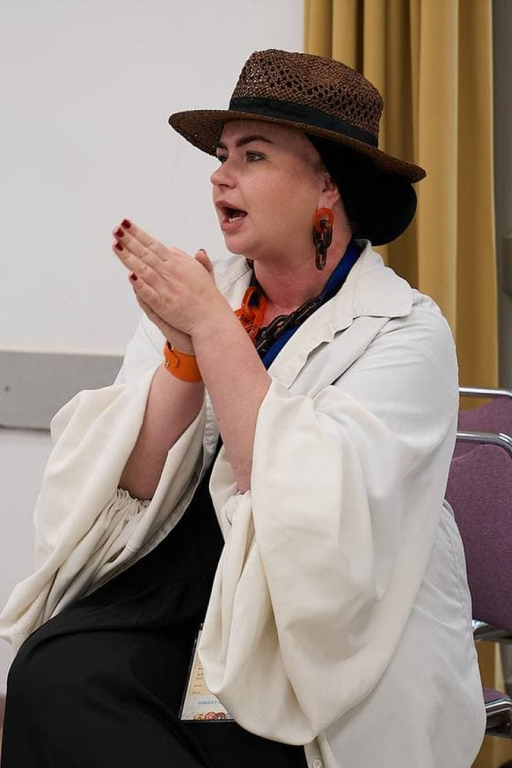 Lecture moment — speaker addressing a group